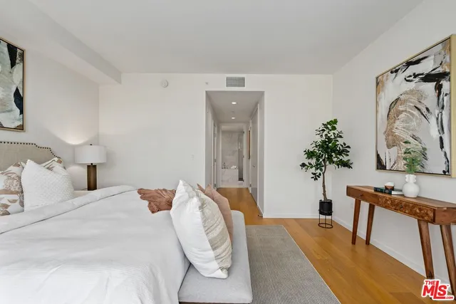 a bathroom with a tub a sink shower and mirror
