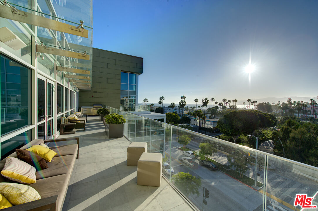 1705 Ocean Avenue, Unit 206 Santa Monica, CA 90401 - Photo 24 of 26 a view of roof deck with couches and potted plants
