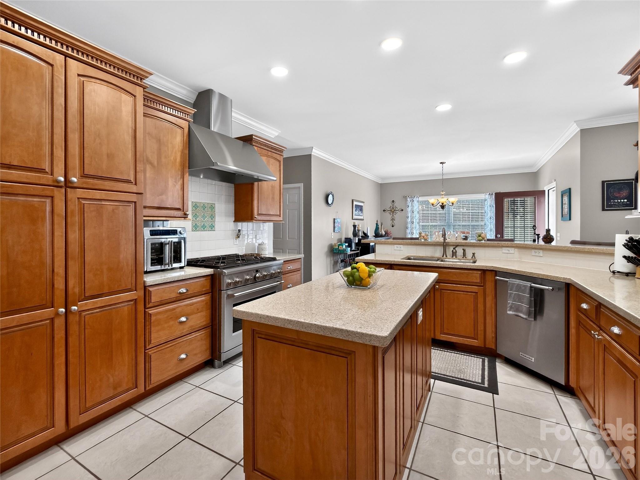 3275 Hanging Rock Road Spruce Pine, NC 28777 - Photo 12 of 48 a kitchen with stainless steel appliances granite countertop a sink and cabinets