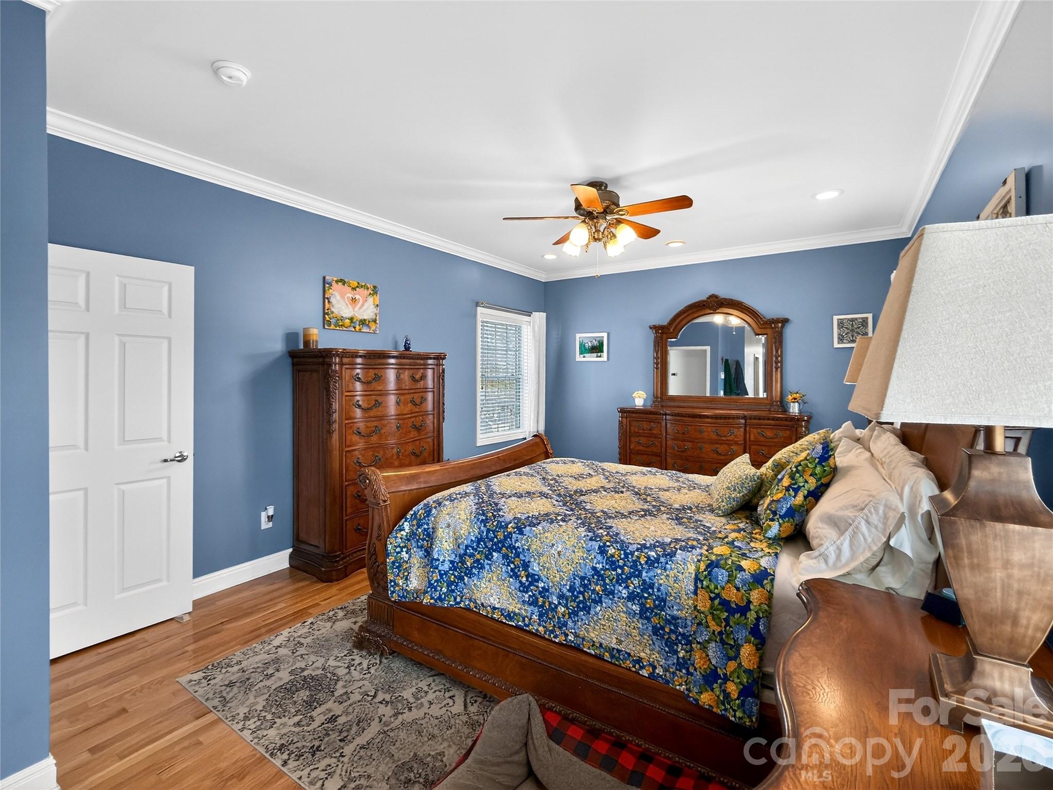 3275 Hanging Rock Road Spruce Pine, NC 28777 - Photo 13 of 48 a bedroom with a bed and wooden floor