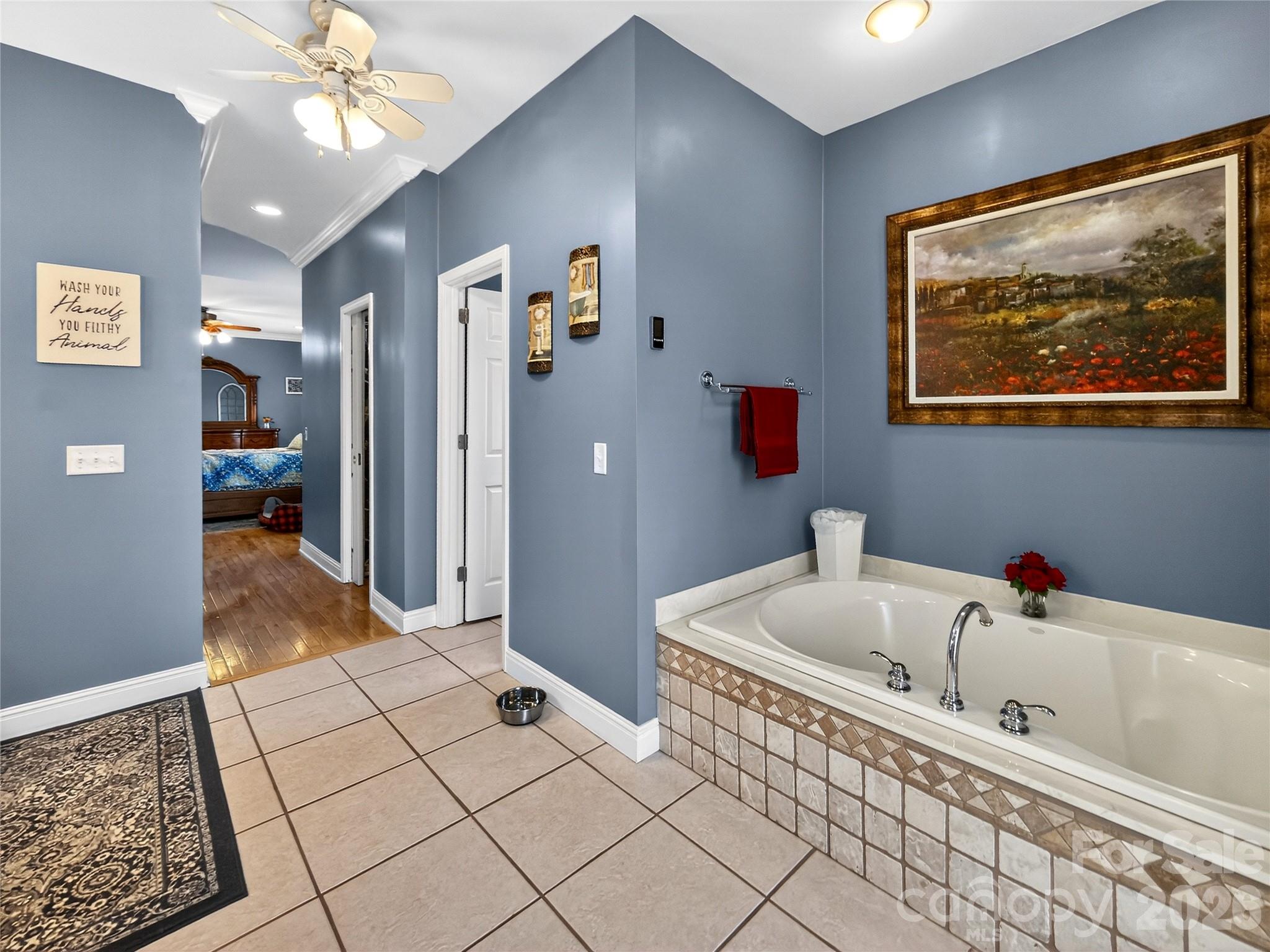 3275 Hanging Rock Road Spruce Pine, NC 28777 - Photo 16 of 48 a bathroom with a bathtub and a shower