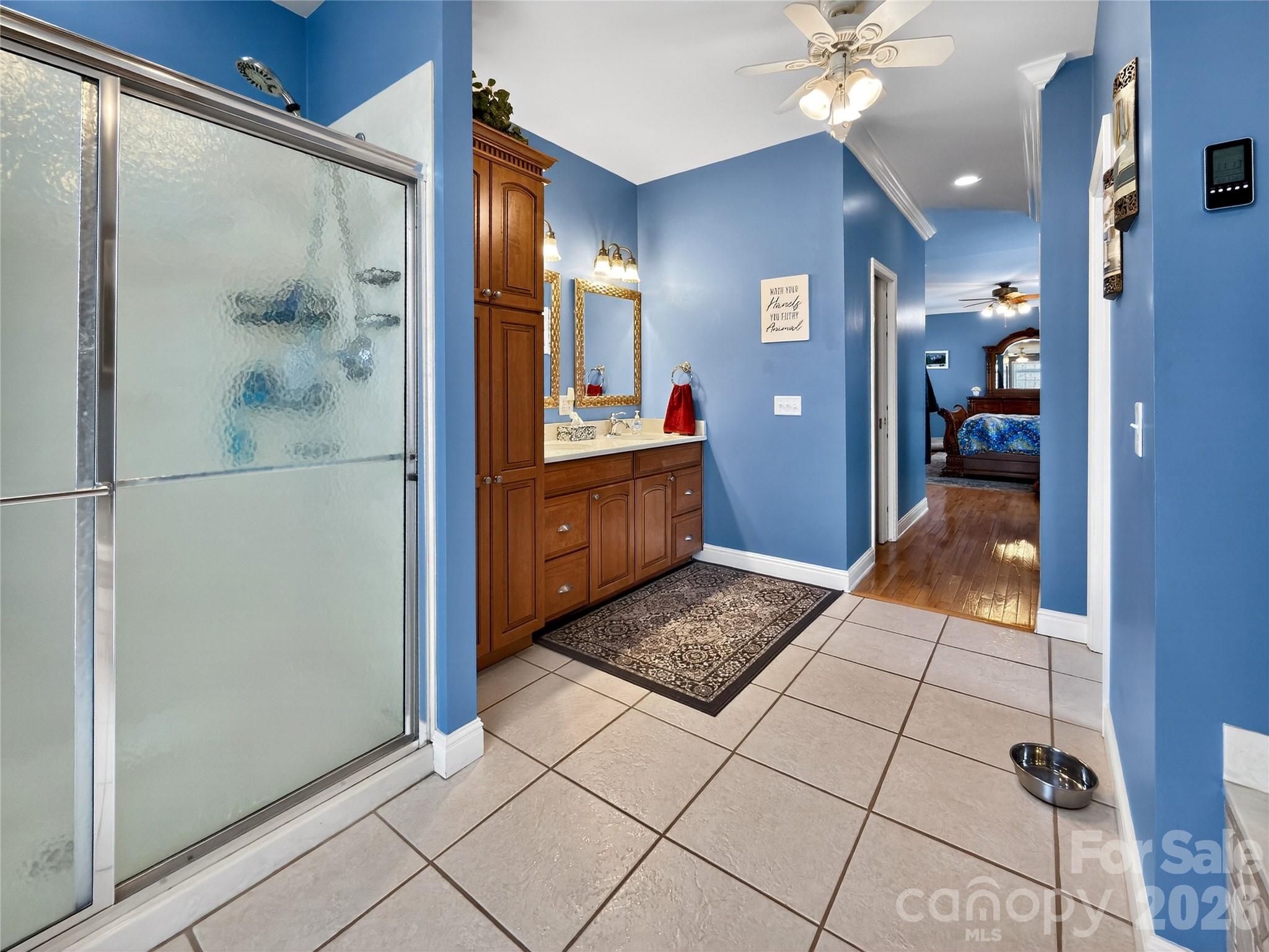 3275 Hanging Rock Road Spruce Pine, NC 28777 - Photo 17 of 48 a bathroom with a glass door shower and a sink