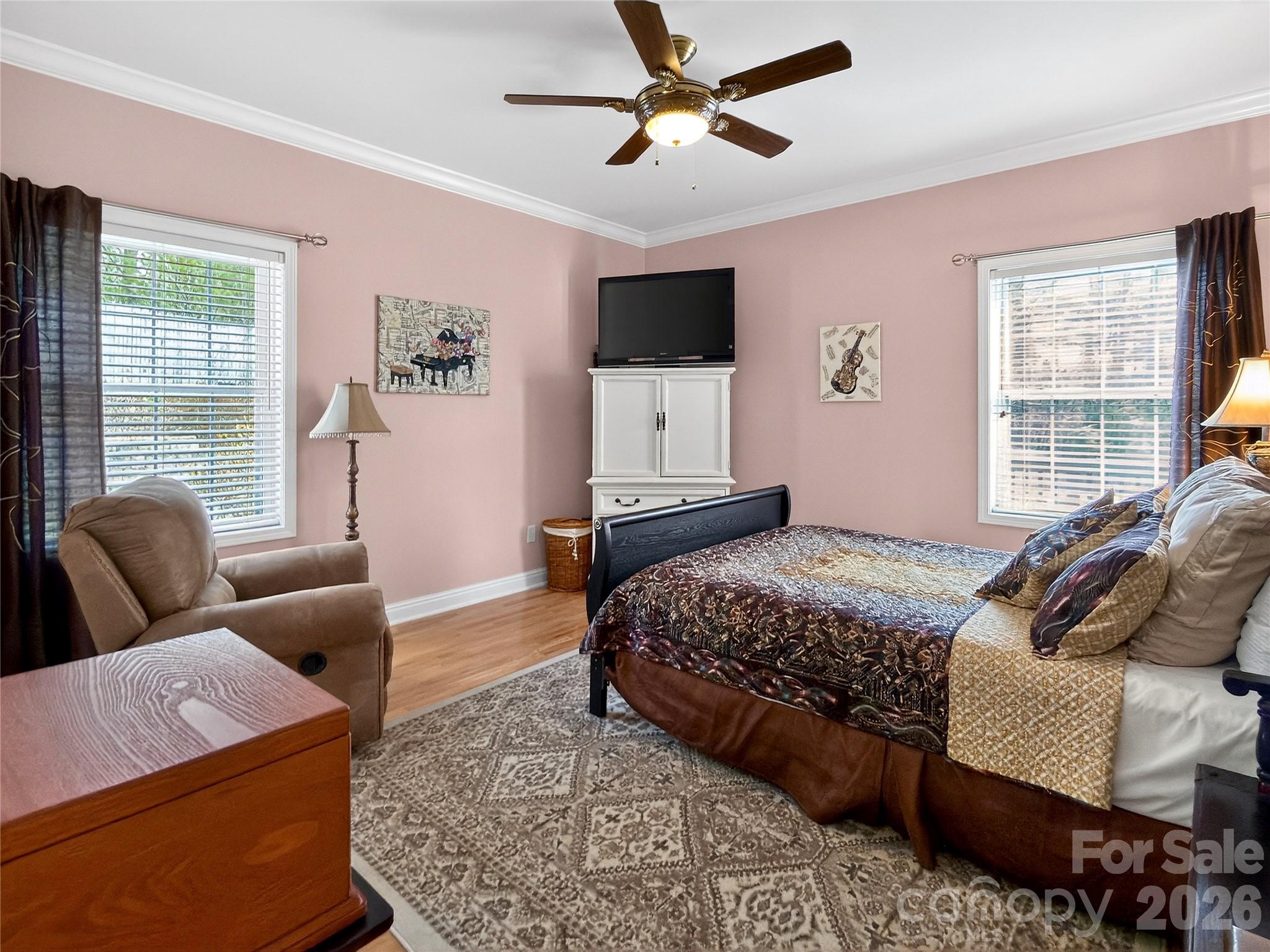 3275 Hanging Rock Road Spruce Pine, NC 28777 - Photo 18 of 48 a bedroom with a bed a couch and a window