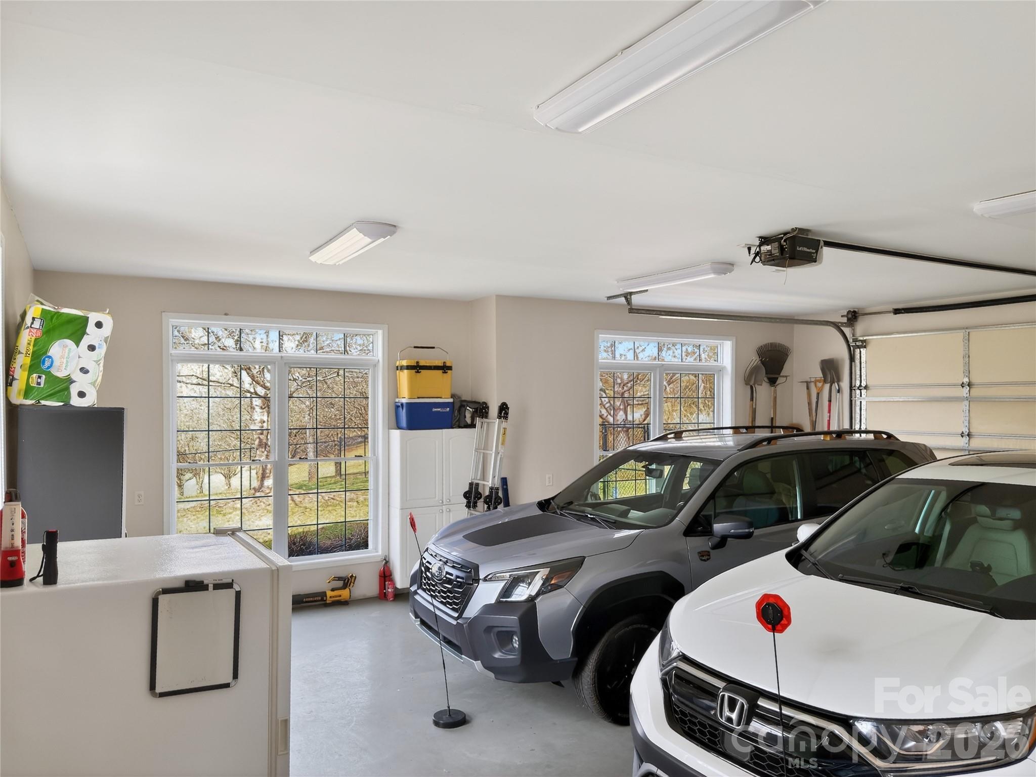 3275 Hanging Rock Road Spruce Pine, NC 28777 - Photo 22 of 48 a bedroom with bed and a large window