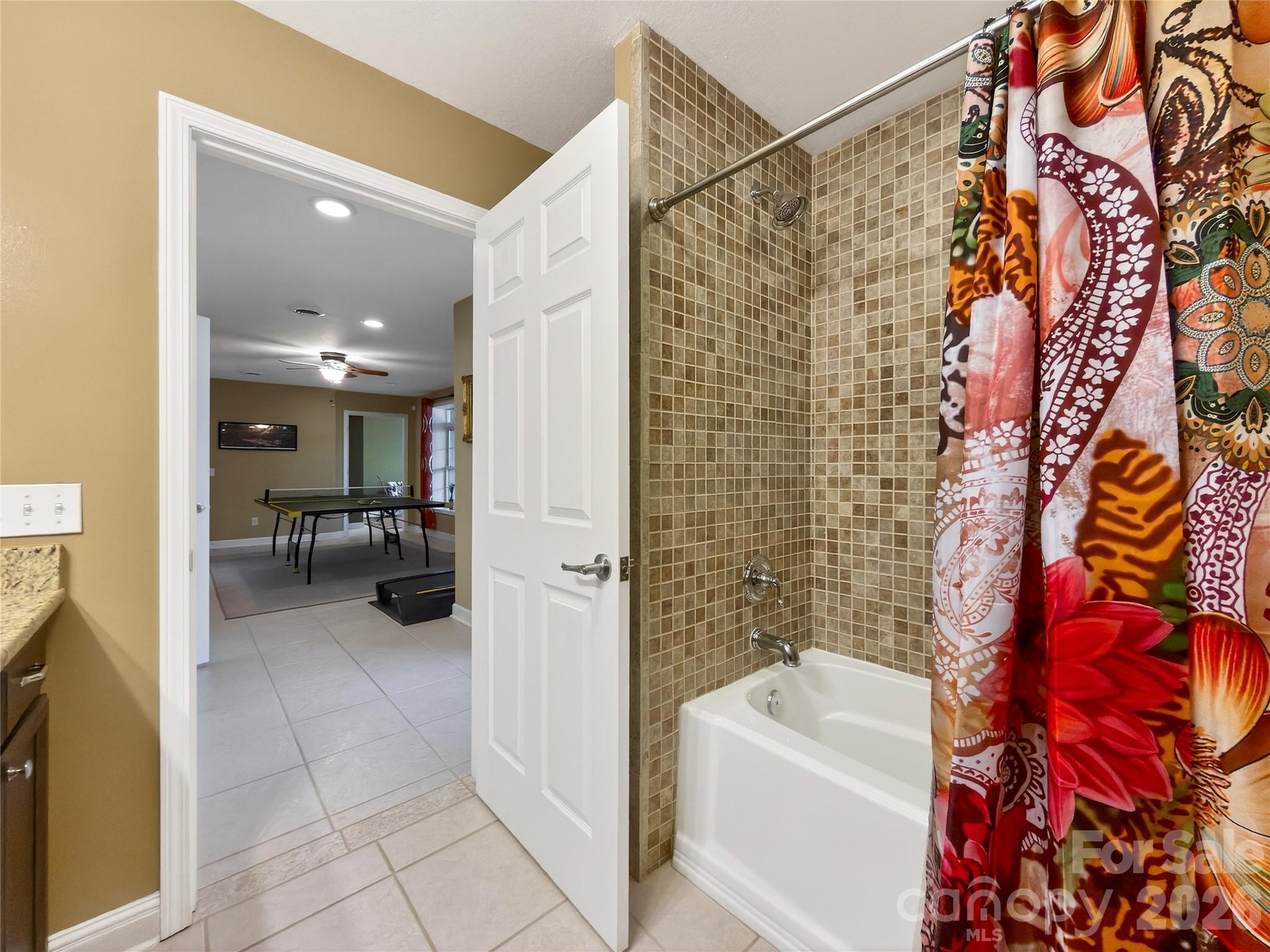 3275 Hanging Rock Road Spruce Pine, NC 28777 - Photo 34 of 48 a bathroom with a sink and a tub