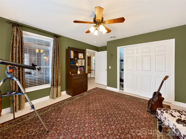a view of a livingroom with furniture and window