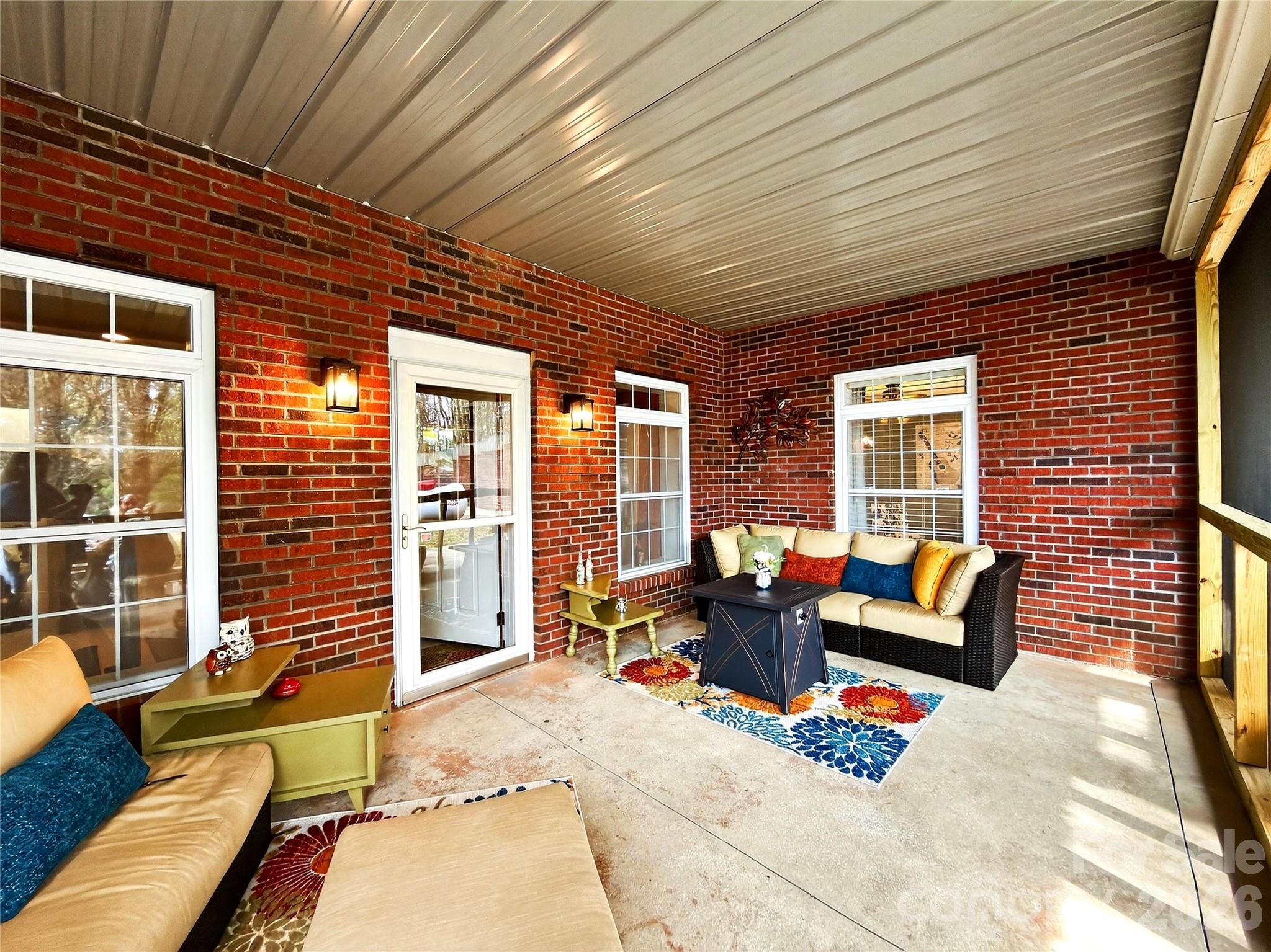 3275 Hanging Rock Road Spruce Pine, NC 28777 - Photo 39 of 48 a outdoor space with patio furniture and windows