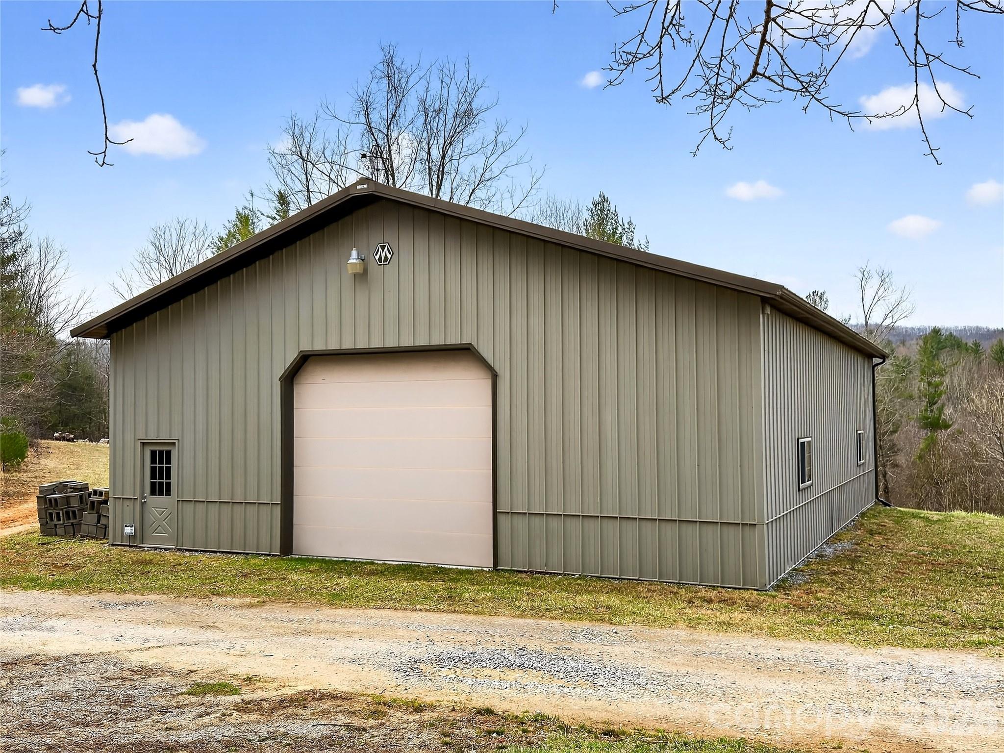 3275 Hanging Rock Road Spruce Pine, NC 28777 - Photo 43 of 48 a view of a house with a garage