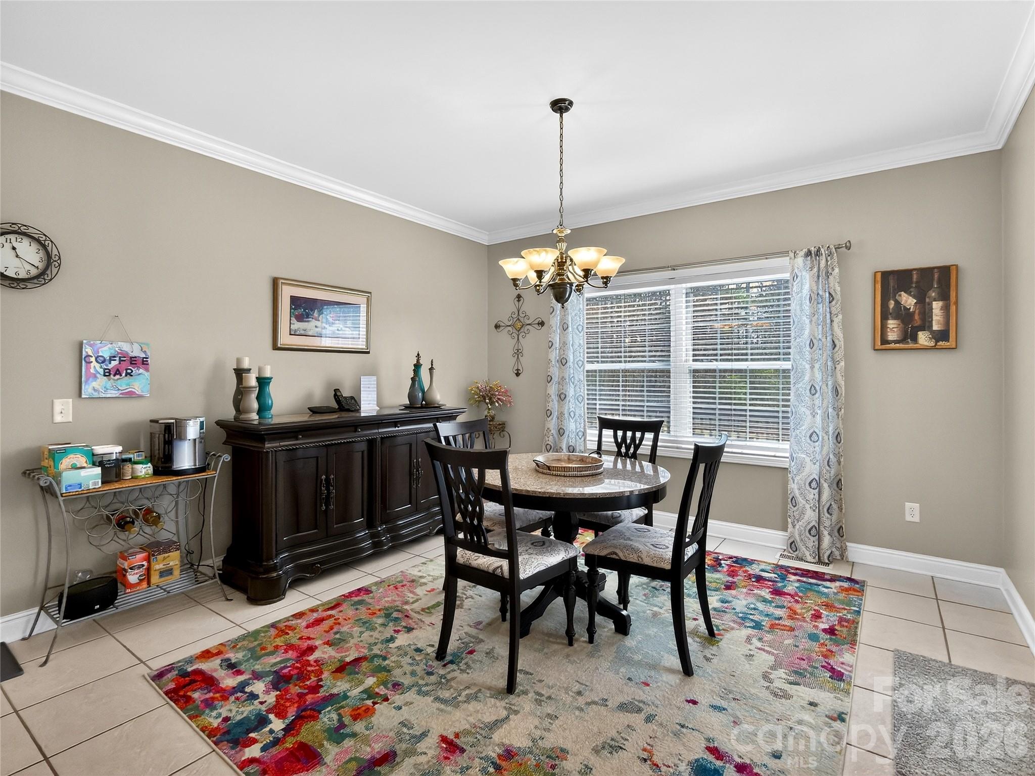 3275 Hanging Rock Road Spruce Pine, NC 28777 - Photo 7 of 48 a view of a dining room with furniture and wooden floor