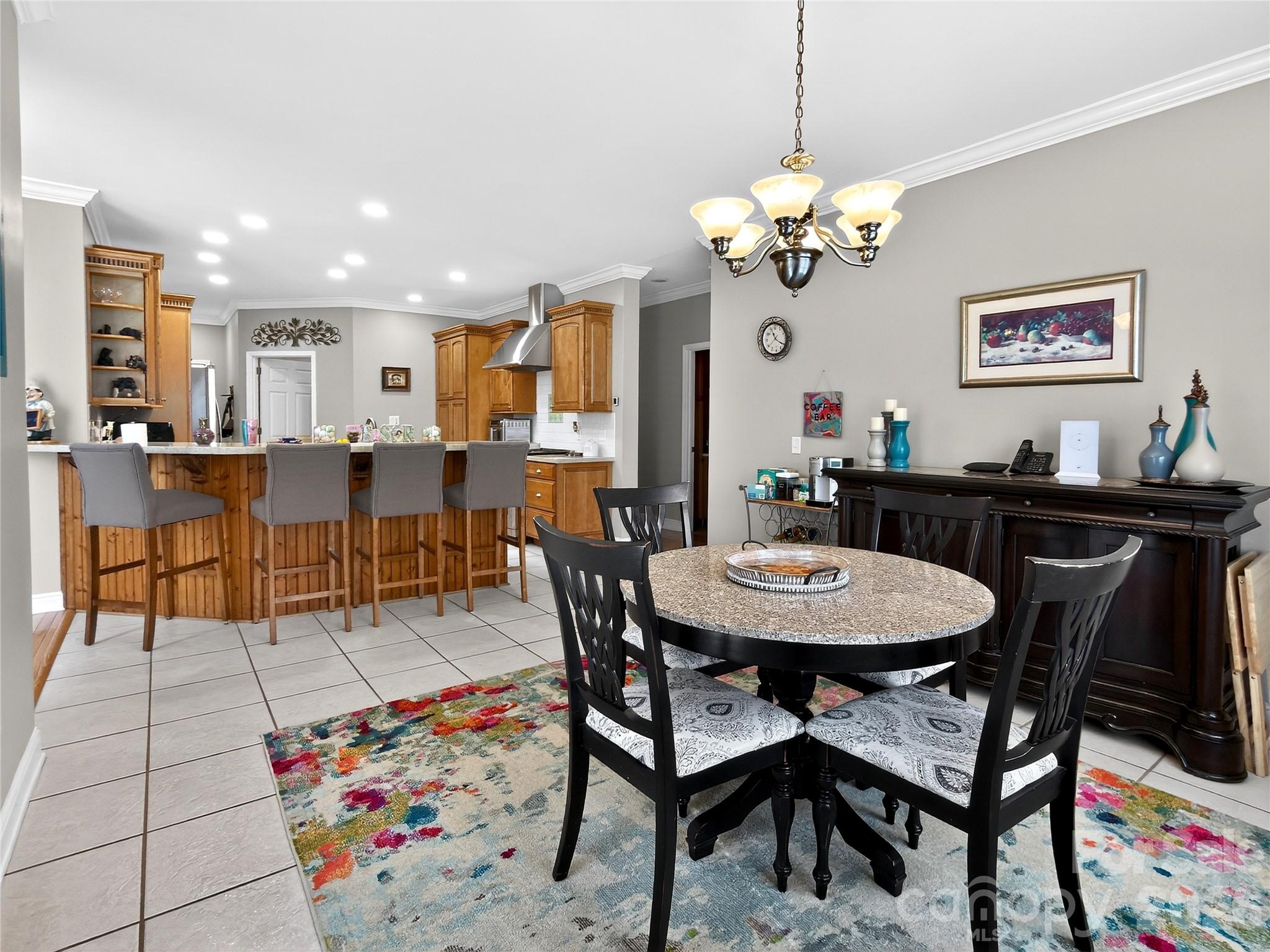 3275 Hanging Rock Road Spruce Pine, NC 28777 - Photo 8 of 48 a view of a dining room with furniture