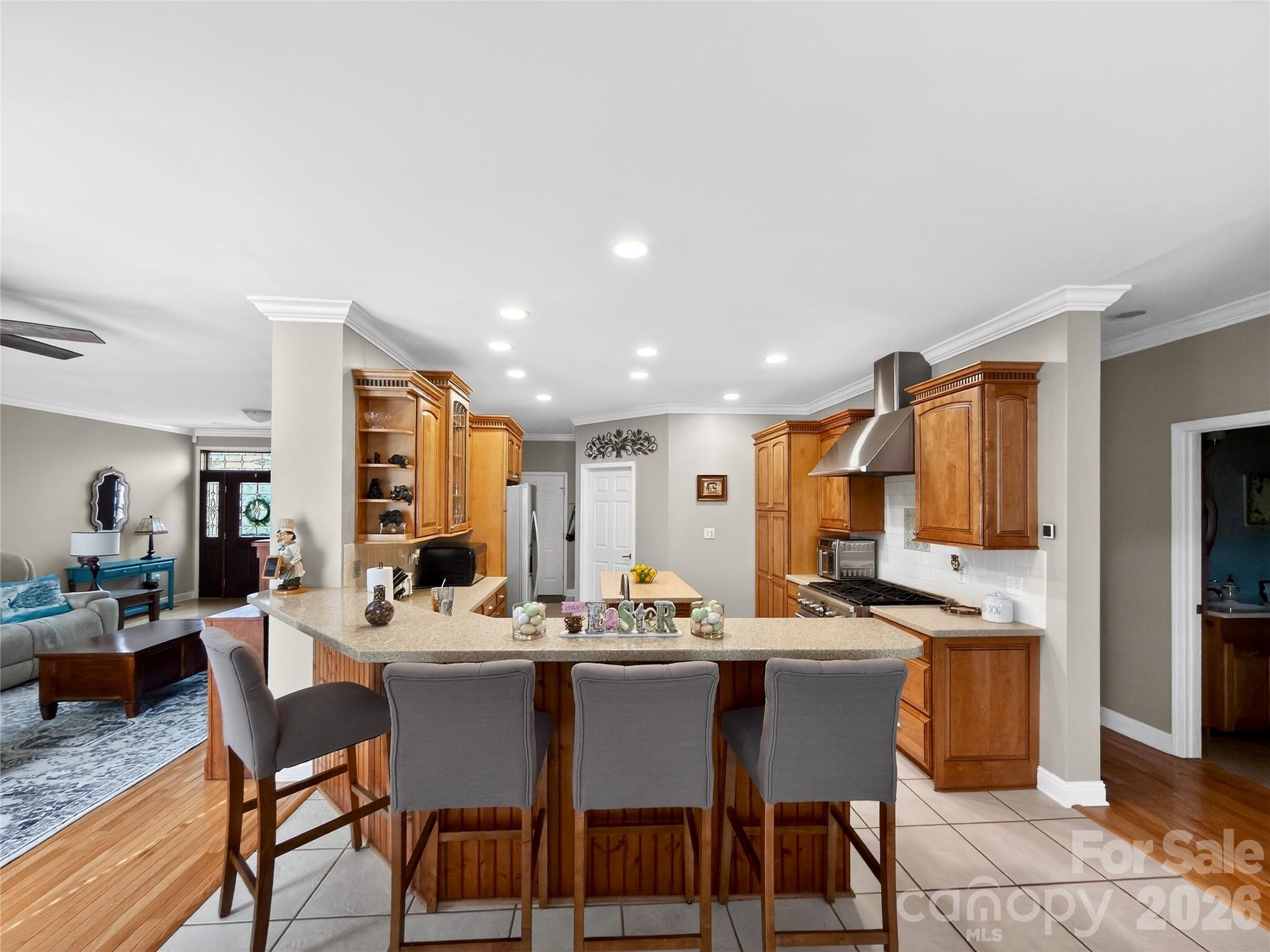 3275 Hanging Rock Road Spruce Pine, NC 28777 - Photo 9 of 48 a view of a dining room with furniture and wooden floor