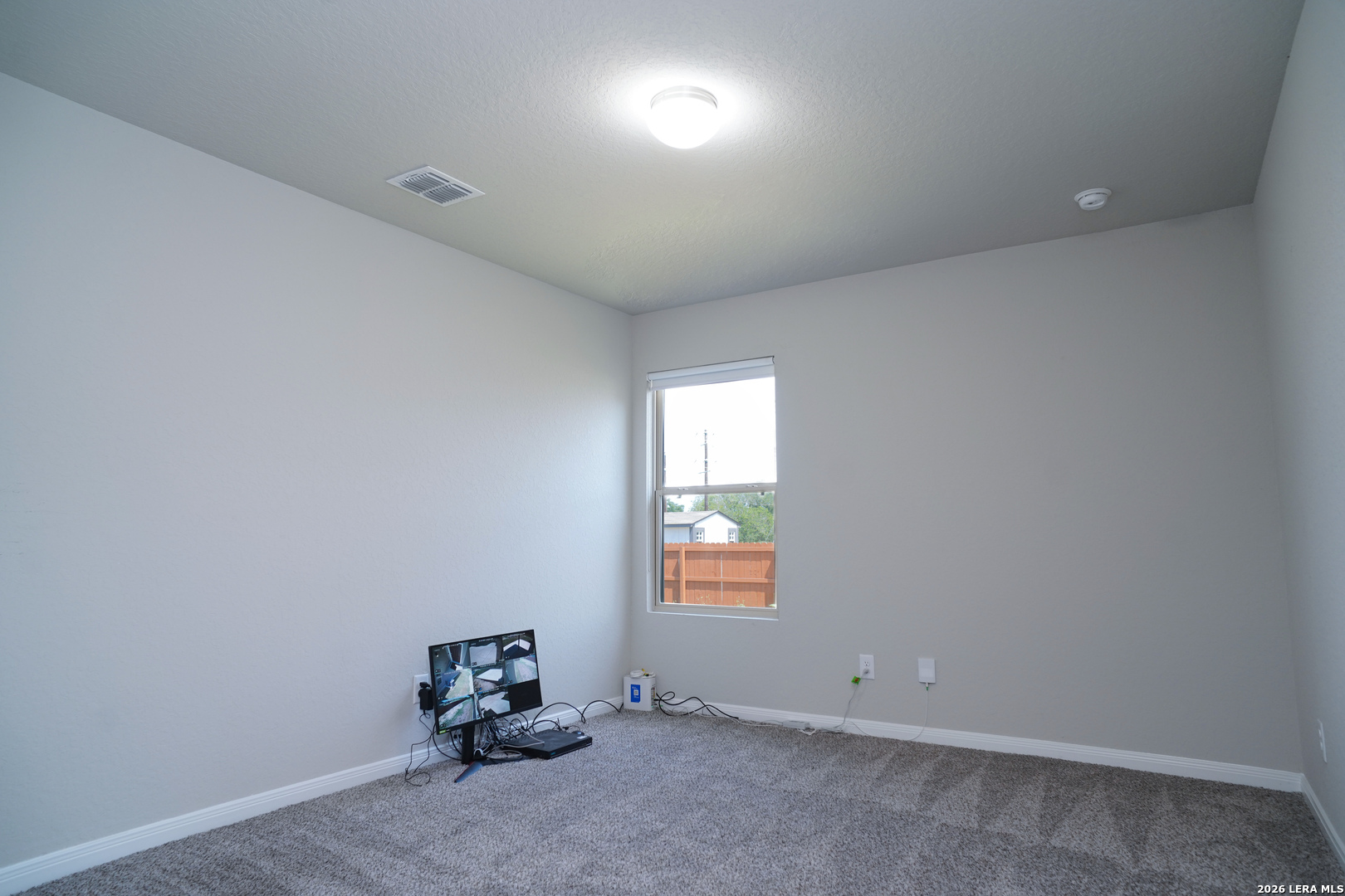 20929 Pleasanton Road San Antonio, TX 78264 - Photo 20 of 51 an empty room with a window
