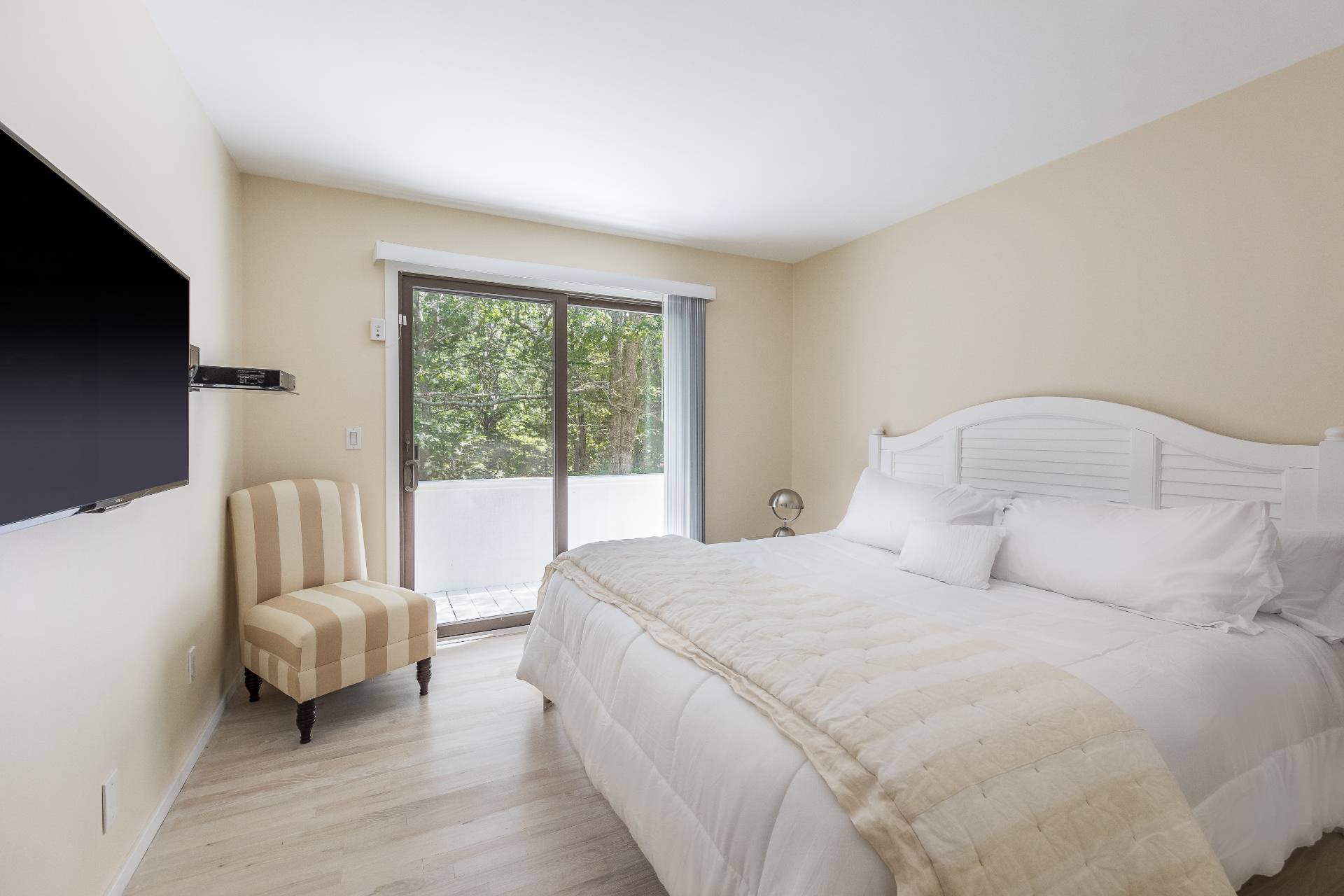 34 Rivers Road East Hampton, NY 11937 - Photo 13 of 17 a bedroom with a bed and couch