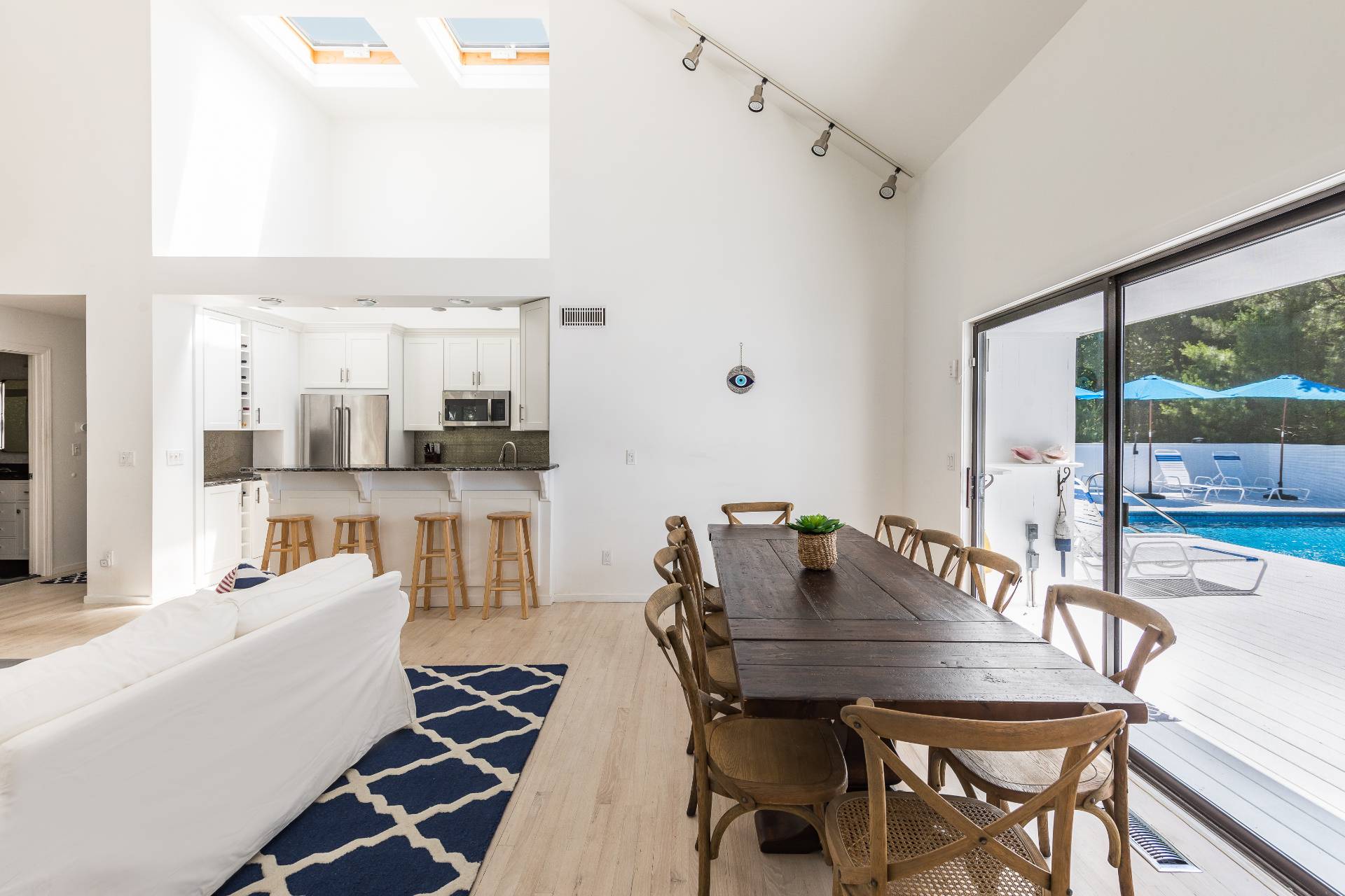 34 Rivers Road East Hampton, NY 11937 - Photo 4 of 17 a living room with furniture and a table