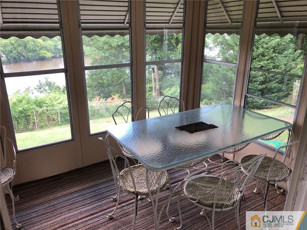 9 Carpender Road New Brunswick, NJ 08901 - Photo 12 of 15 a view of a dining room with furniture window and outside view