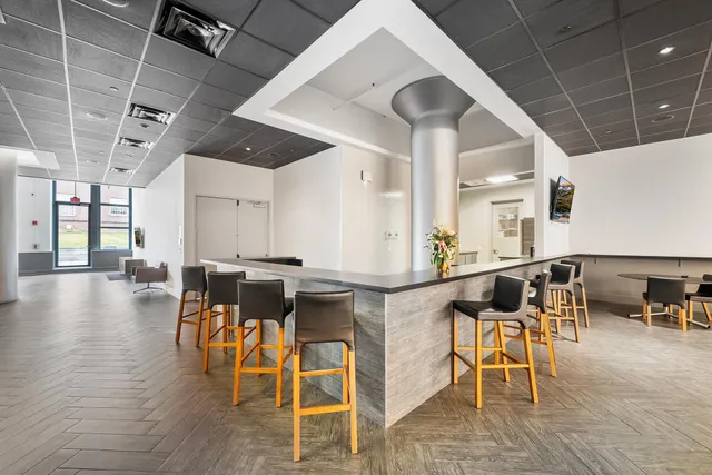 a view of a dining room with furniture