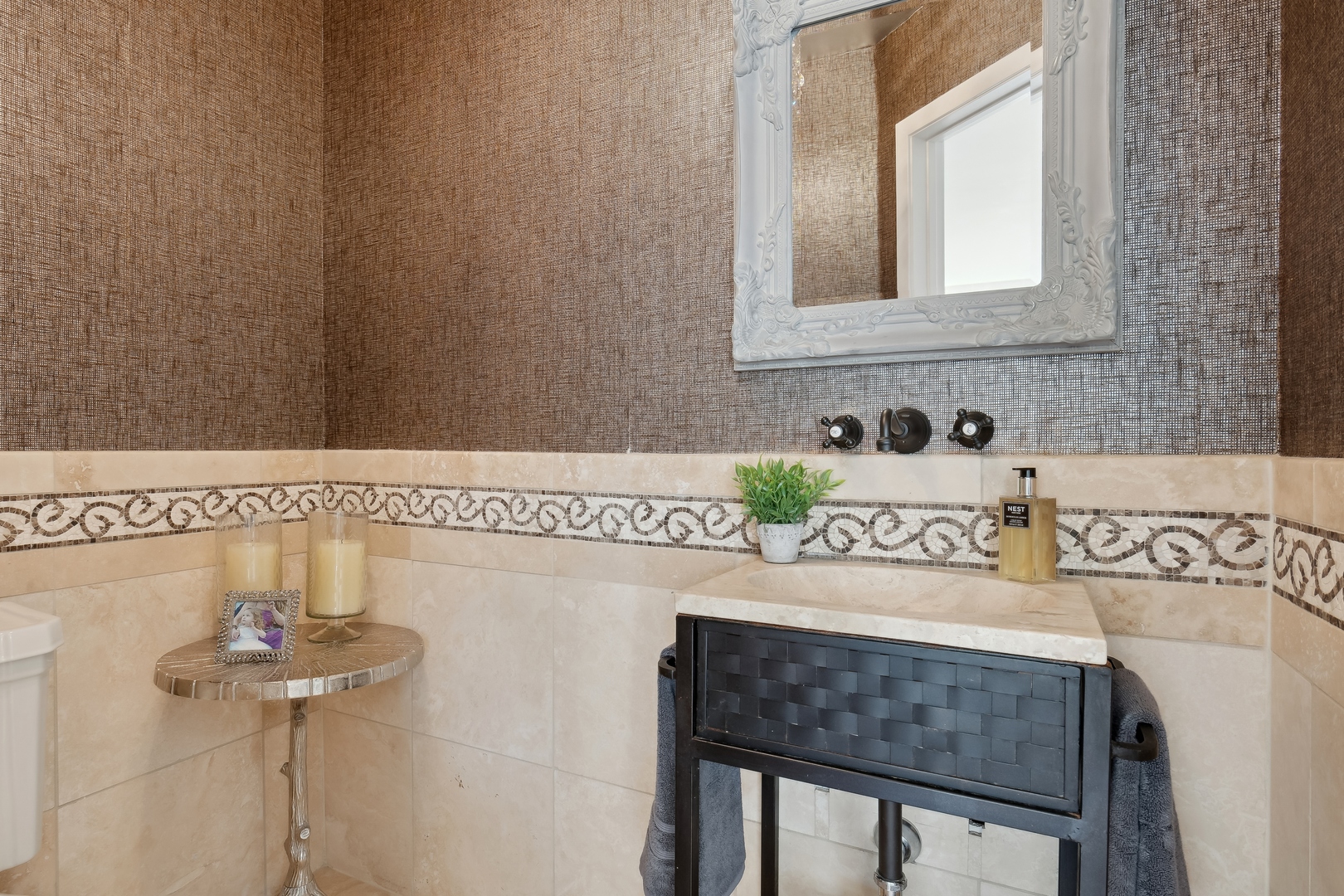 811 South Ridge Road Lake Forest, IL 60045 - Photo 17 of 47 a bathroom with a sink a vanity and a window