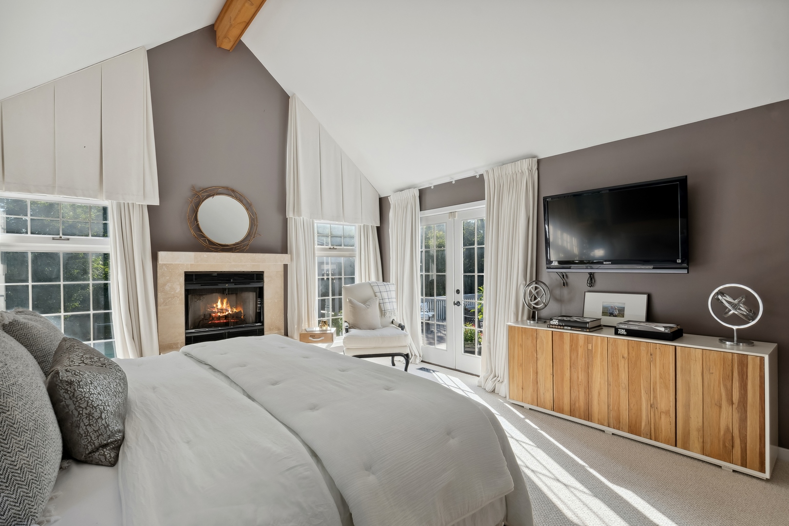 811 South Ridge Road Lake Forest, IL 60045 - Photo 20 of 47 a bedroom with a bed and a flat screen tv