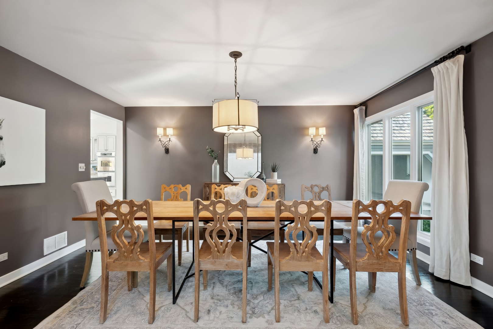 811 South Ridge Road Lake Forest, IL 60045 - Photo 3 of 47 a dining room with furniture a chandelier and window