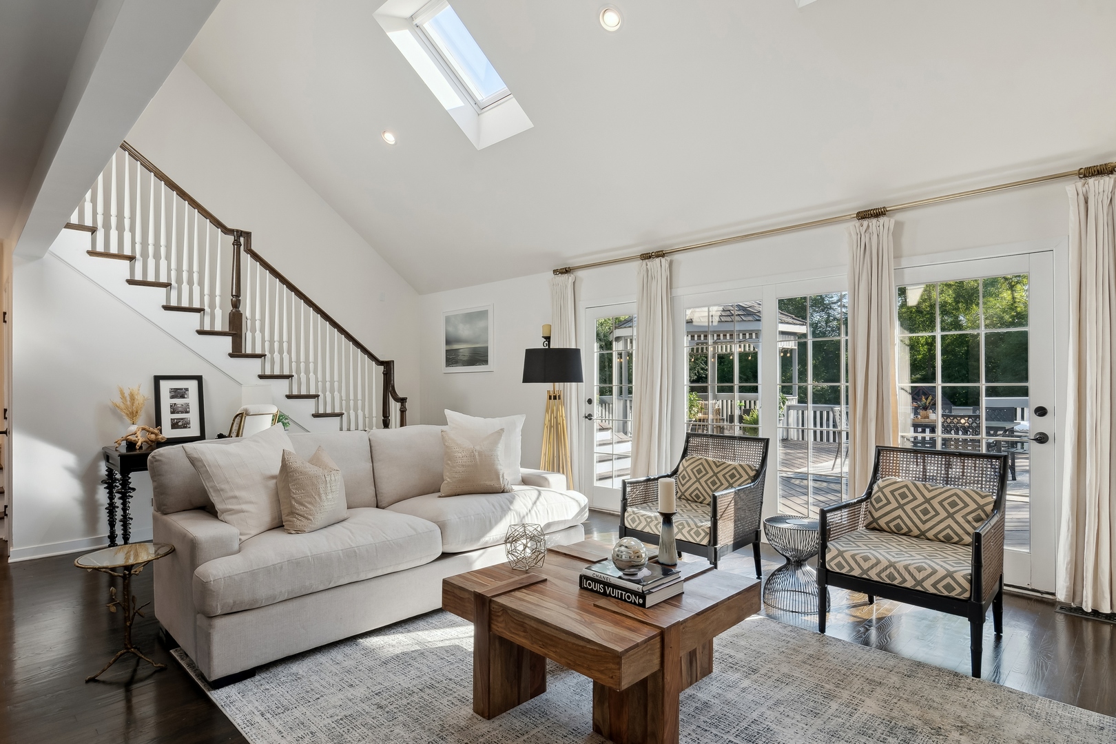 811 South Ridge Road Lake Forest, IL 60045 - Photo 7 of 47 a living room with furniture and a table with wooden floor