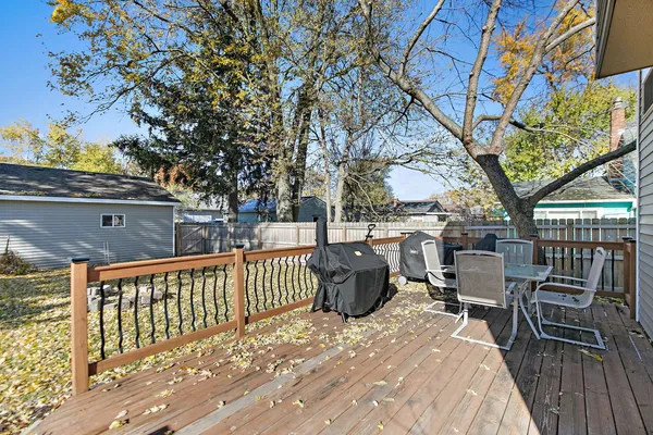 a view of roof deck with furniture