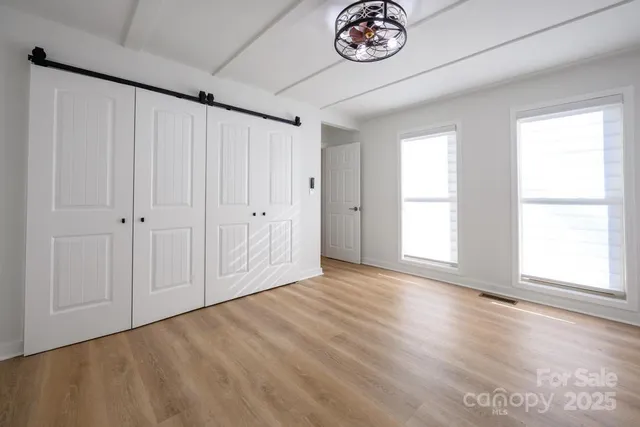 a aerial view of a house with a yard