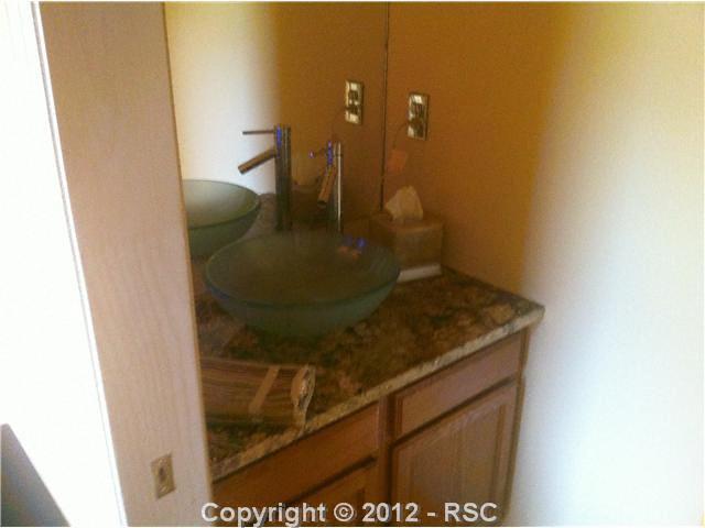 5630 Wilson Road Colorado Springs, CO 80919 - Photo 15 of 16 main level half bath