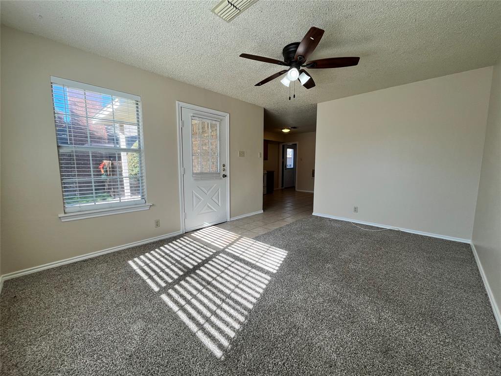 524 Strata Drive Denton, TX 76201 - Photo 6 of 17 This view shows the open entry into the kitchen.