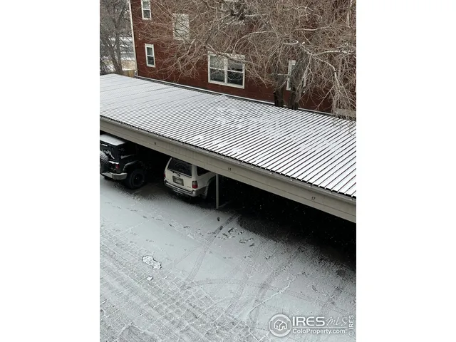 a sign on the wall next to a building