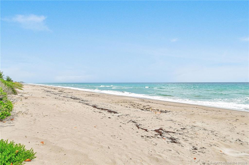 108 Island Dunes Cove Jensen Beach, FL 34957 - Photo 23 of 35 a view of beach and ocean
