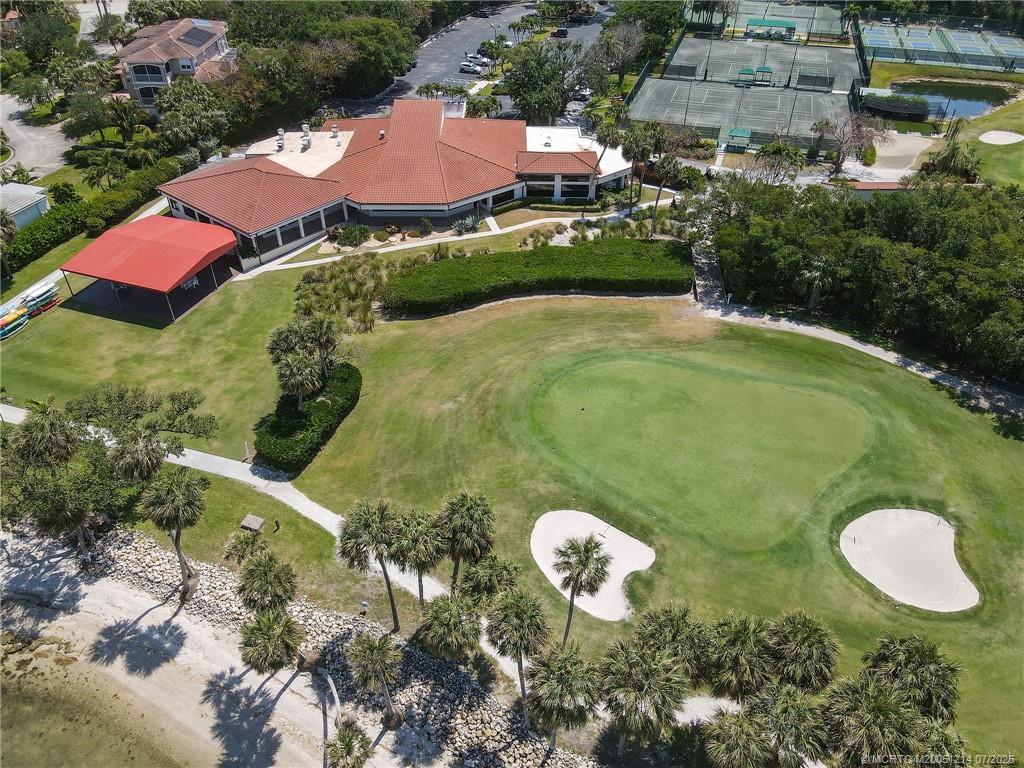108 Island Dunes Cove Jensen Beach, FL 34957 - Photo 28 of 35 a aerial view of a house with a swimming pool and outdoor seating