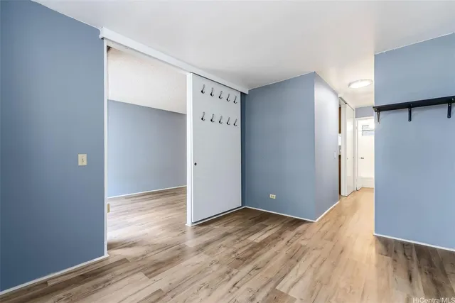 a view of wooden floor in an empty room