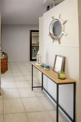 a living room with a flat screen tv