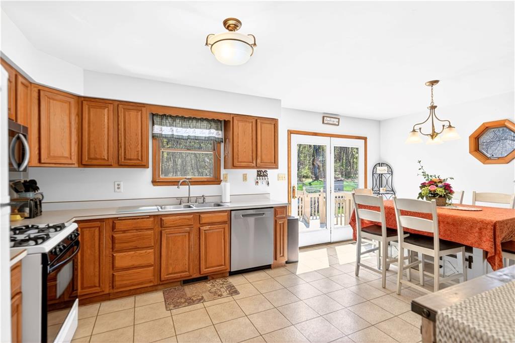 24 Sevich Alley Monongahela, PA 15063 - Photo 19 of 48 a kitchen with a sink and chairs