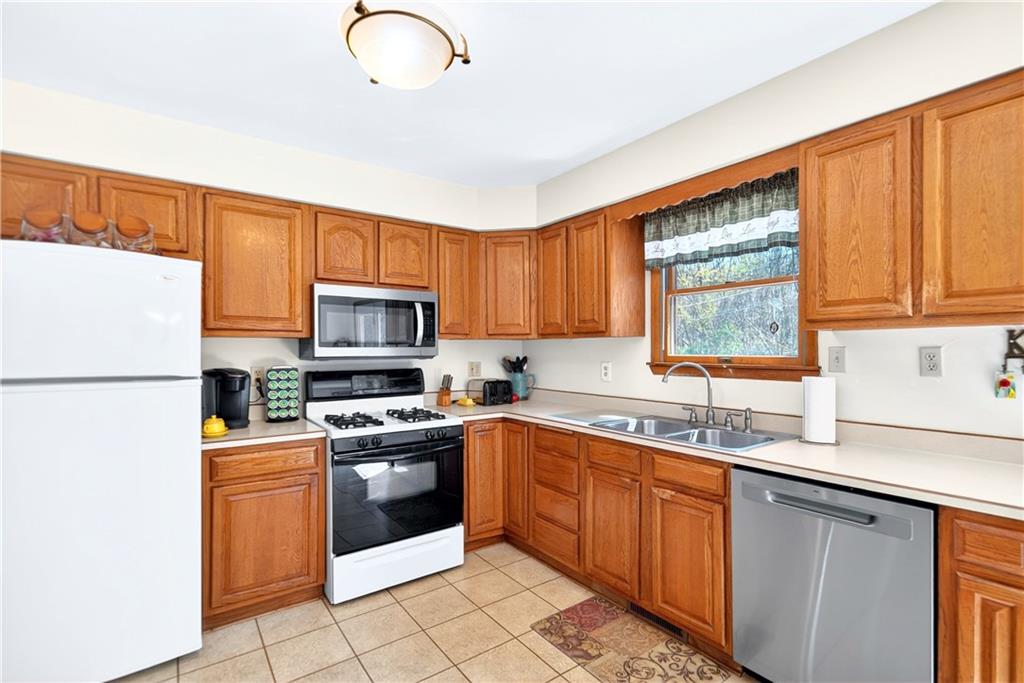24 Sevich Alley Monongahela, PA 15063 - Photo 20 of 48 a kitchen with a sink stove and refrigerator