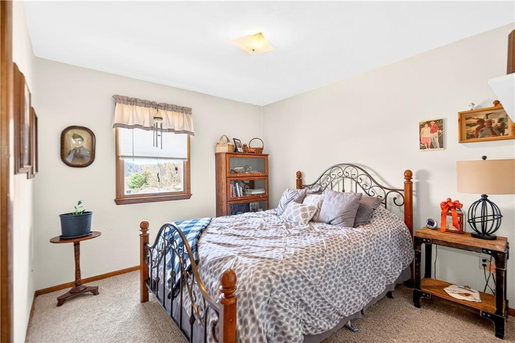 24 Sevich Alley Monongahela, PA 15063 - Photo 26 of 48 a bedroom with a bed and a table in it