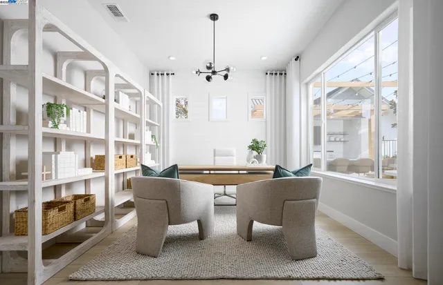 a dining room with furniture window and wooden floor