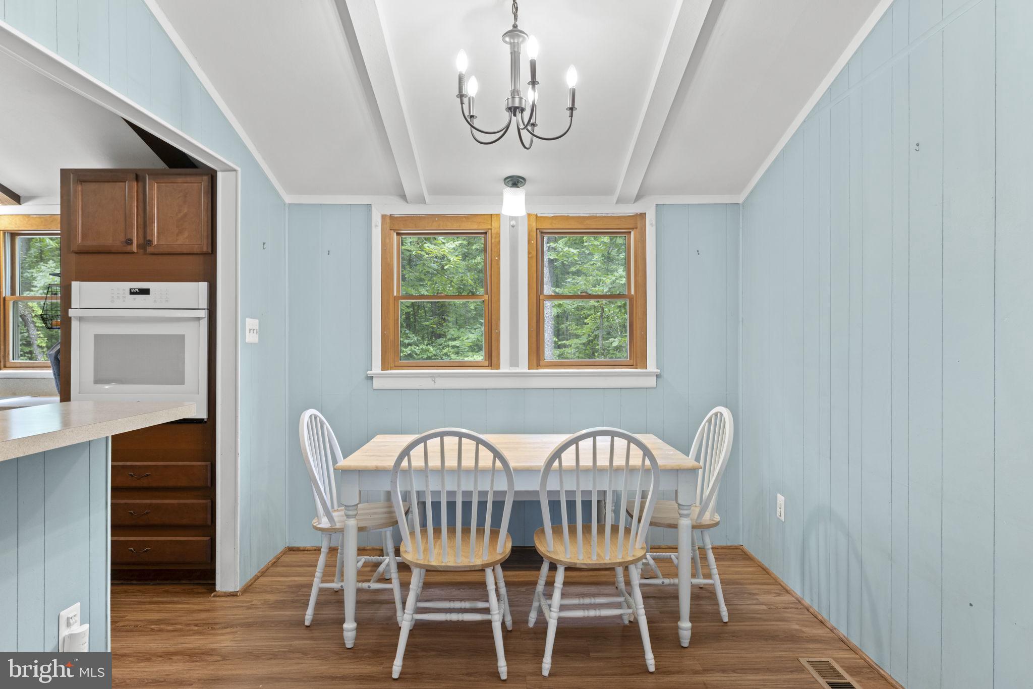9448 Green Road Midland, VA 22728 - Photo 29 of 91 a view of a dining room with furniture window and wooden floor