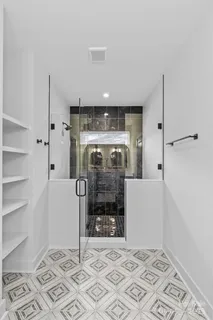 a view of an empty room with a fireplace