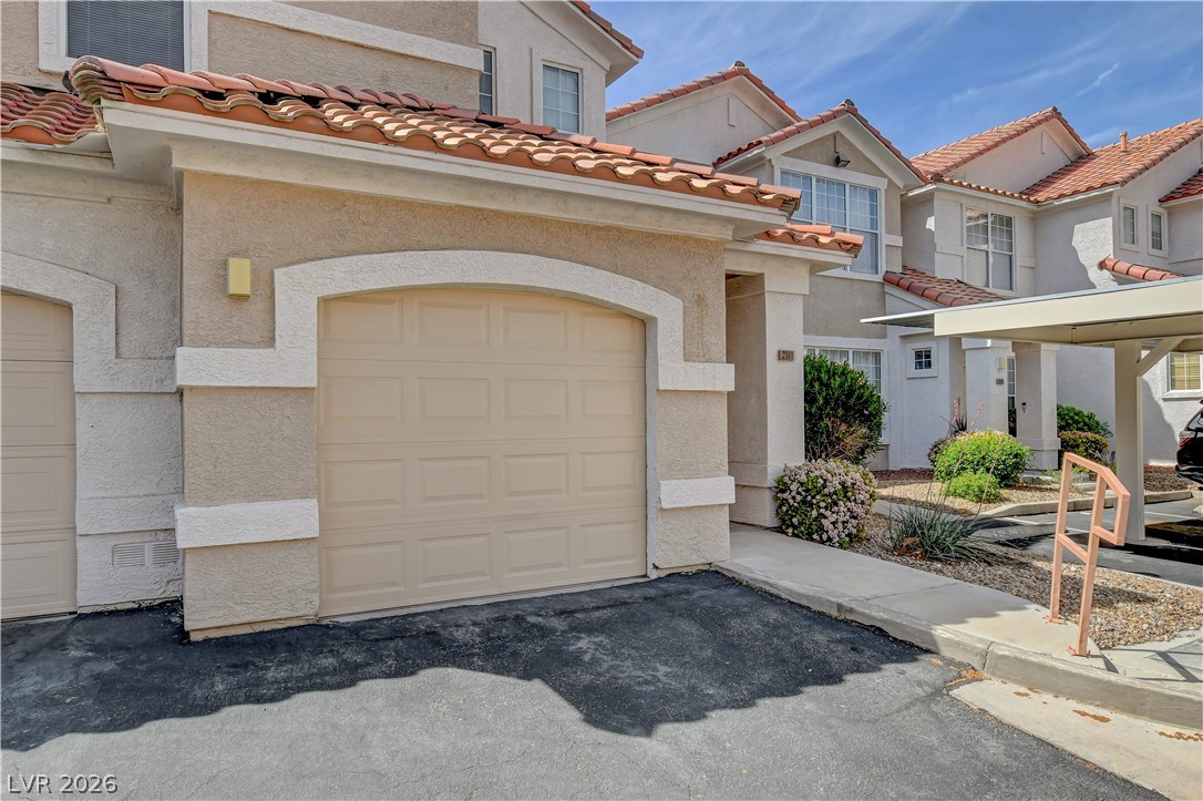 8555 West Russell Road, Unit 2091 Las Vegas, NV 89113 - Photo 25 of 26 View of garage.