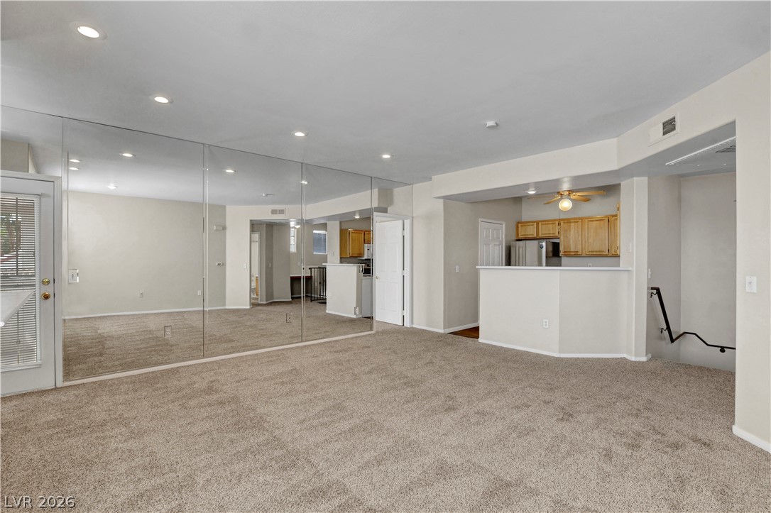 8555 West Russell Road, Unit 2091 Las Vegas, NV 89113 - Photo 5 of 26 Living room featuring carpet, recessed lighting