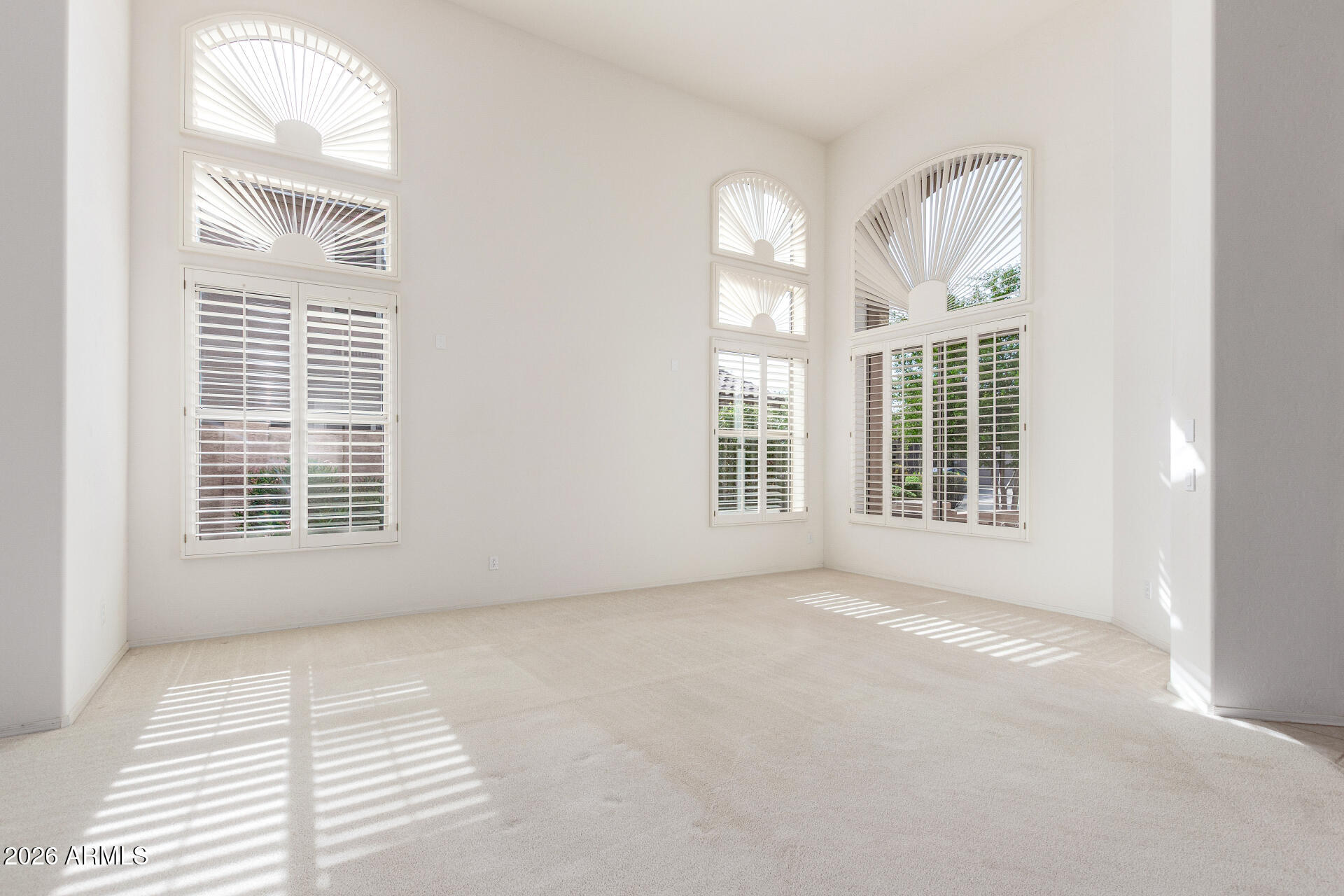 3430 North Mountain Ridge, Unit 13 Mesa, AZ 85207 - Photo 15 of 115 a view of an empty room with a window