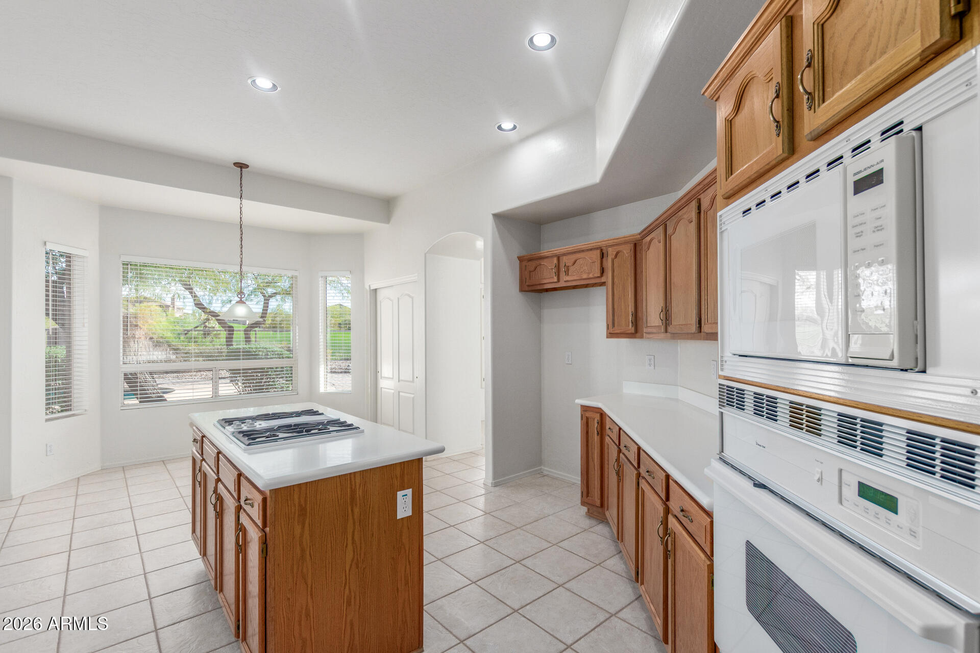 3430 North Mountain Ridge, Unit 13 Mesa, AZ 85207 - Photo 23 of 115 a kitchen with sink cabinets and window