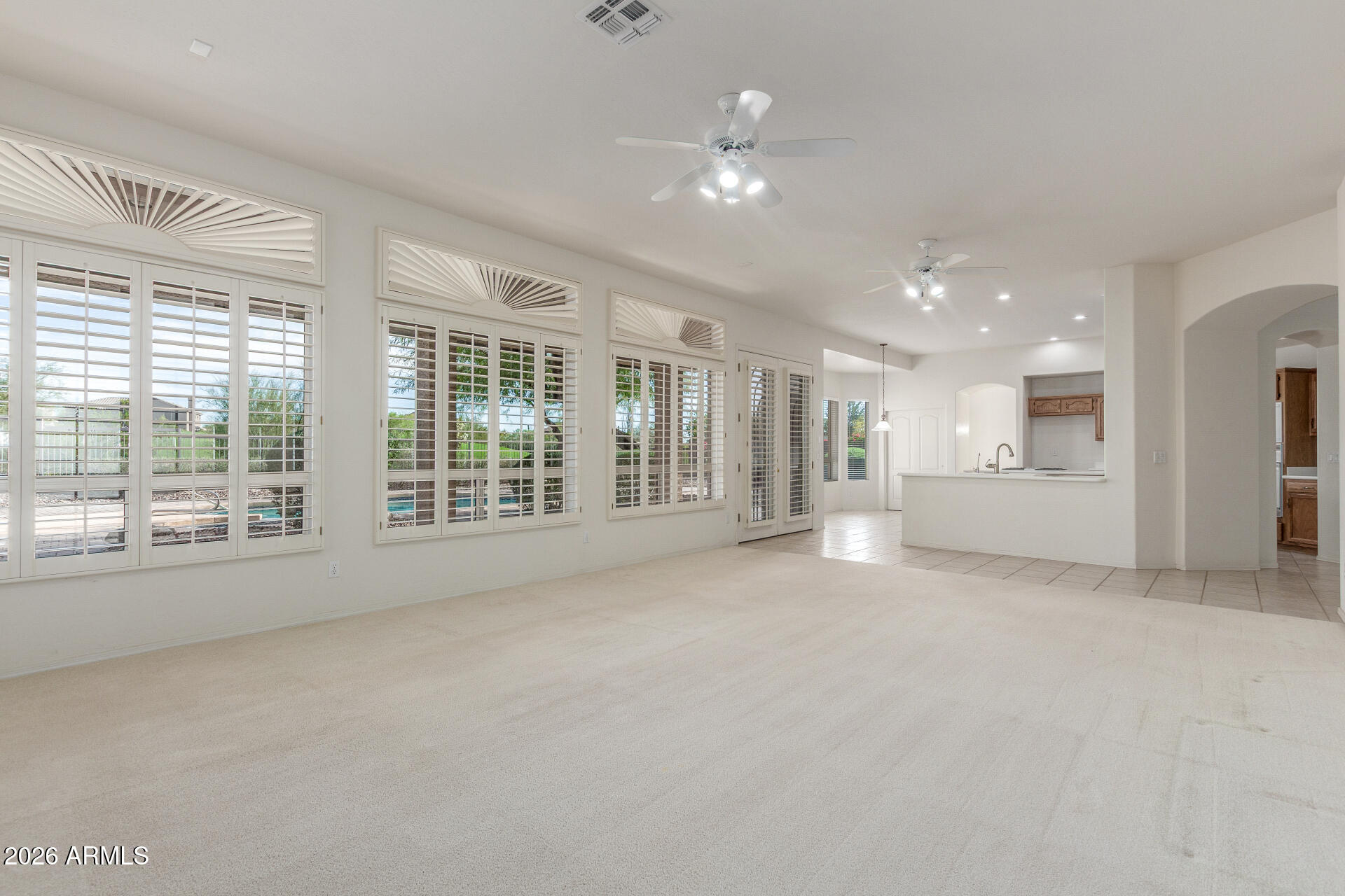 3430 North Mountain Ridge, Unit 13 Mesa, AZ 85207 - Photo 27 of 115 a view of an empty room with a window