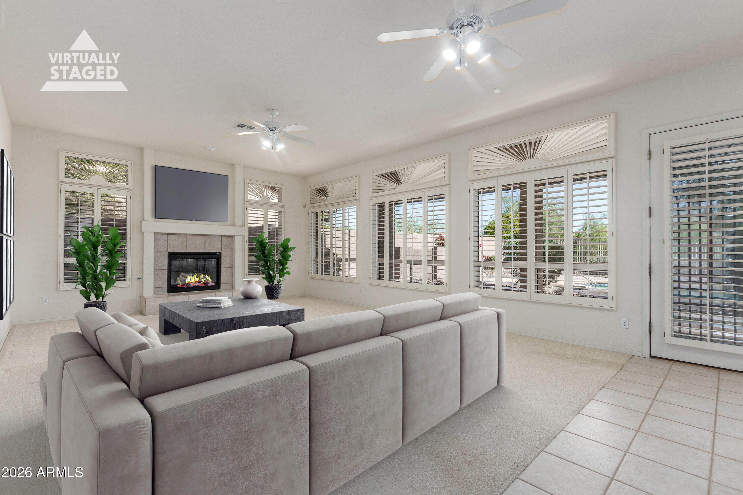 3430 North Mountain Ridge, Unit 13 Mesa, AZ 85207 - Photo 29 of 124 a living room with furniture and a fireplace