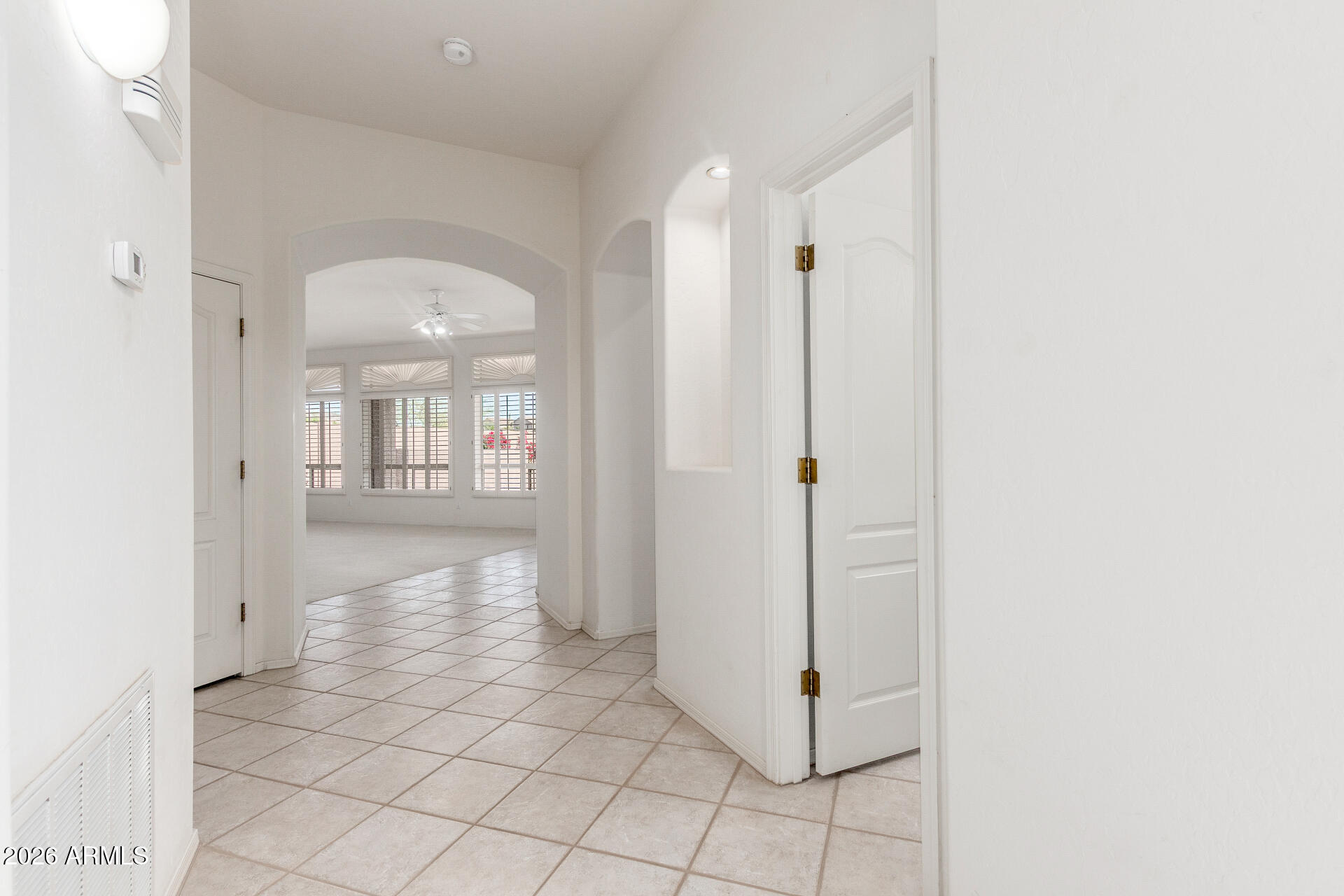 3430 North Mountain Ridge, Unit 13 Mesa, AZ 85207 - Photo 29 of 115 a view of a hallway with wooden floor