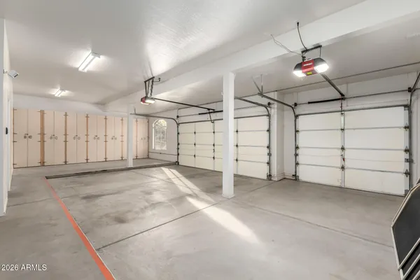 a view of a swimming pool with a yard