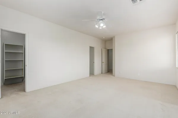 a view of a backyard with sitting area