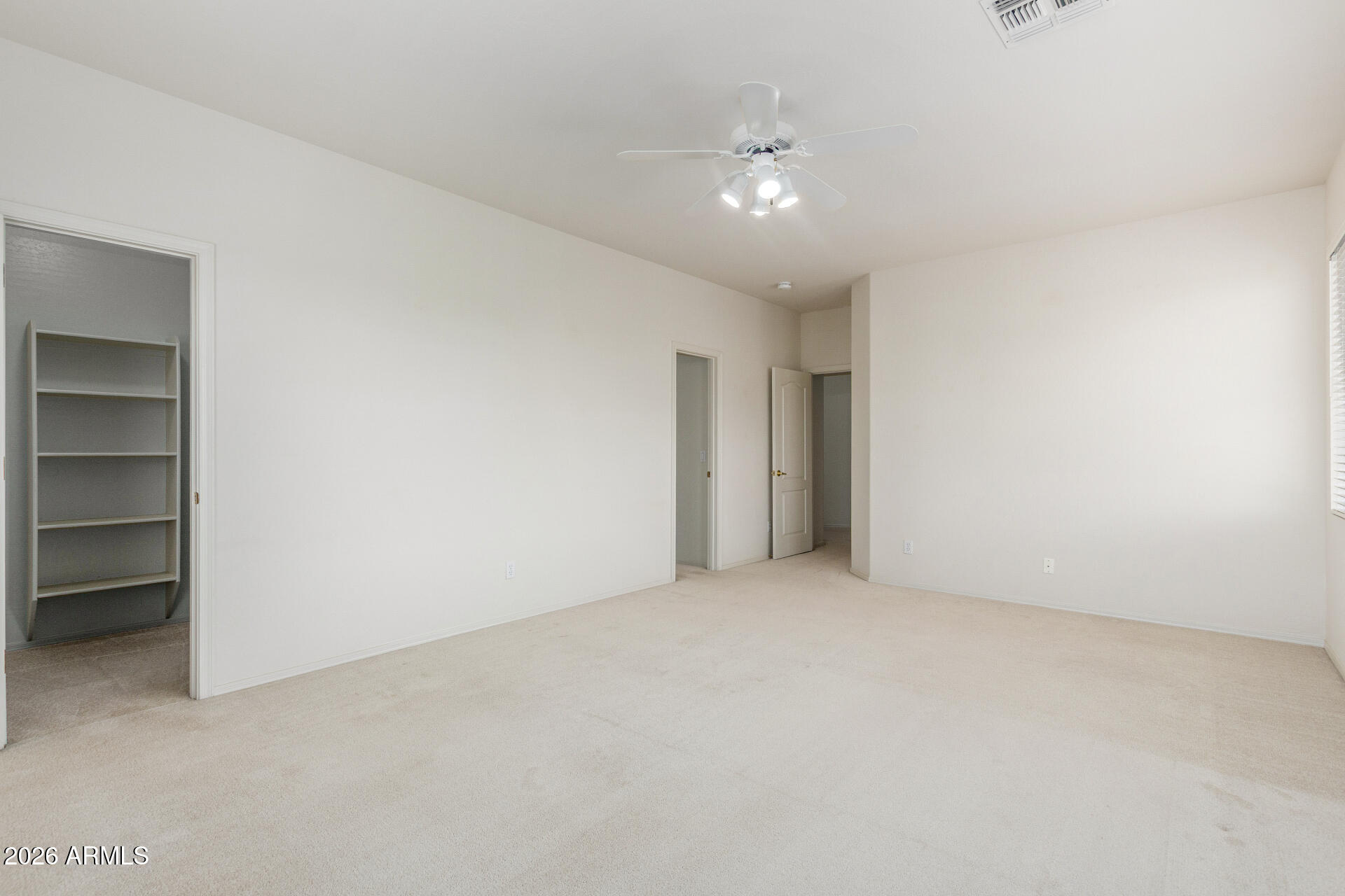3430 North Mountain Ridge, Unit 13 Mesa, AZ 85207 - Photo 44 of 115 a view of an empty room with a cabinet