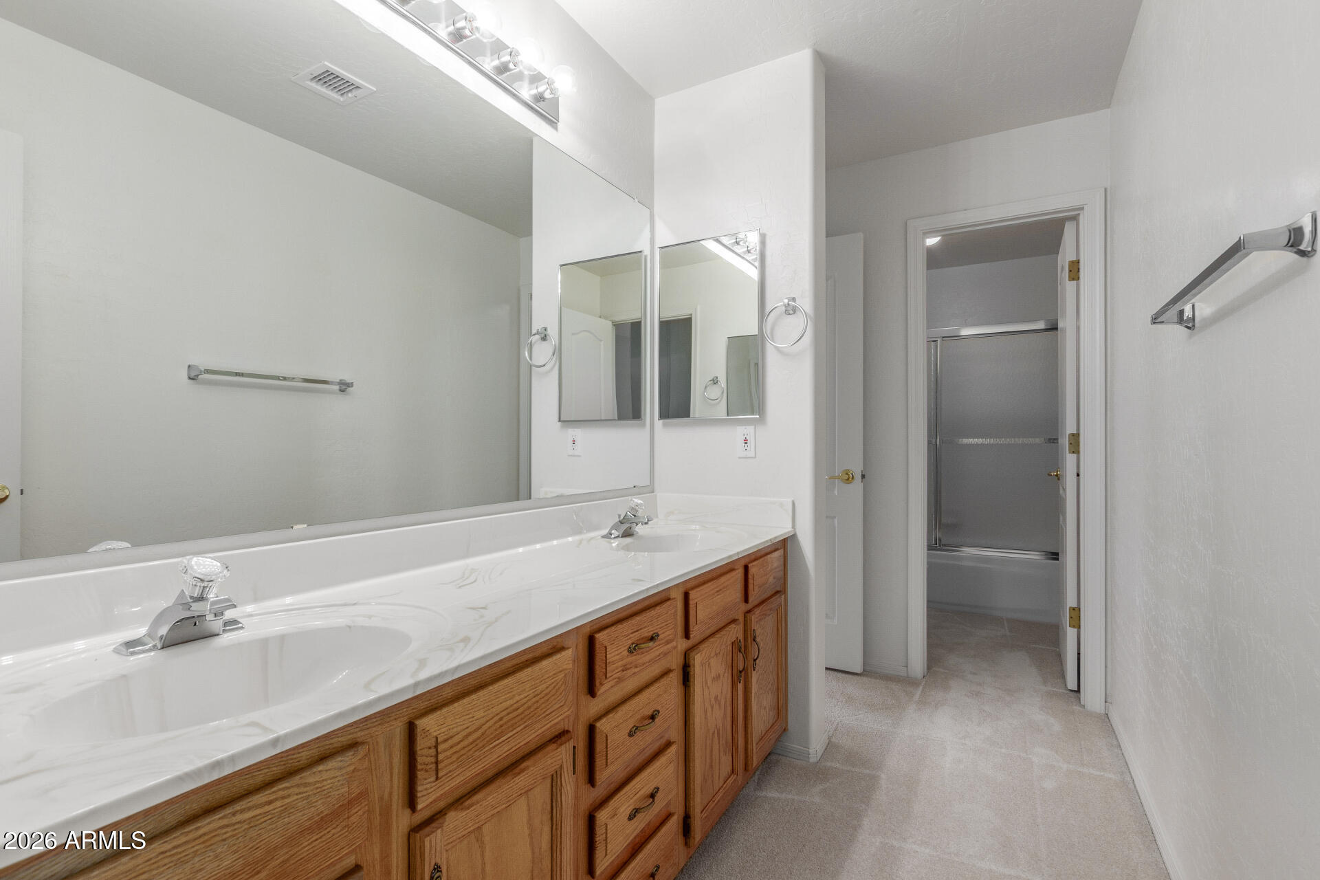 3430 North Mountain Ridge, Unit 13 Mesa, AZ 85207 - Photo 46 of 115 a bathroom with a sink and a mirror